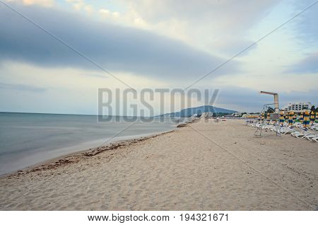 The Black Sea Shore From Albena, Bulgaria With Golden Sands, Sun, Blue Mystic Water, Umbrellas And S