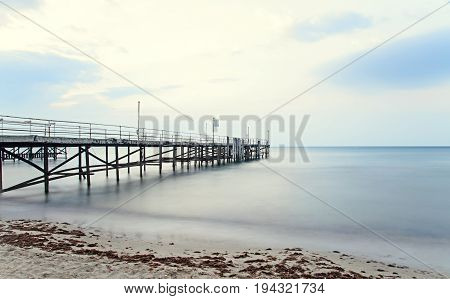 The Black Sea Shore From Albena, Bulgaria With Golden Sands, Sun, Blue Mystic Water, Seaside Bridge