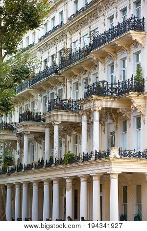 London, UK - September 8, 2016: Windows of the luxury apartments in Kensington. Centre London residential buildings.  Kensington church street.