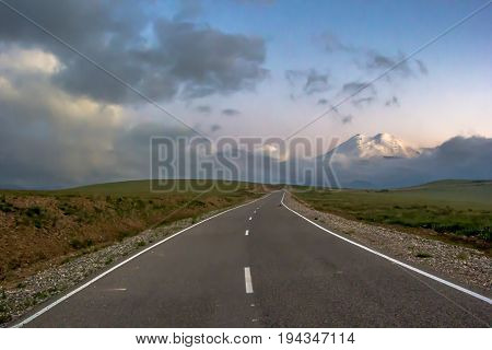 High Mount Elbrus, beautiful view of snow tops, mountain panorama, sights and mountains of the North Caucasus, trailering, mountain road