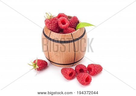 fresh rasberry in wooden bowl isolated on white background