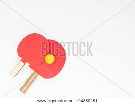 Sport background. Red ping-pong rackets and balls. Flat lay top view