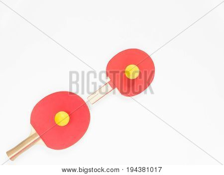 Sport background. Red ping-pong rackets and balls. Flat lay top view