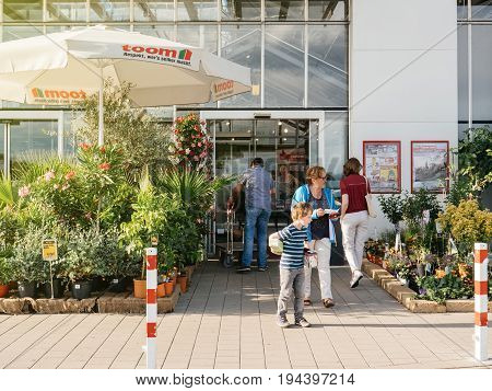 FRANKFURT GERMANY - JUN 30 2017: TOOM Baumarkt entrance - the German DIY-store chain offering home improvement and do-it-yourself goods - customers buying goods selecting the best tools