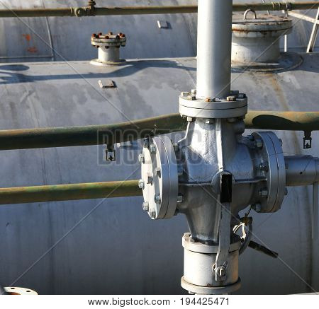Large Shut-off Valve Over The Large Fuel Tank In The Storage Are