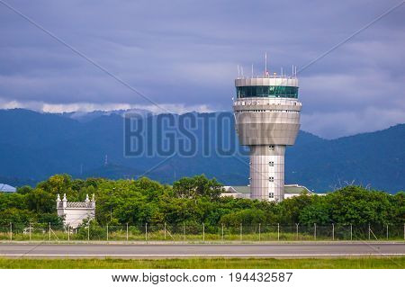Airport control tower at Kota Kinabalu International Airport Sabah,Malaysia.ATC purpose is to prevent collisions,organise & expedite the flow of air traffic,& provide information & other support for pilots.
