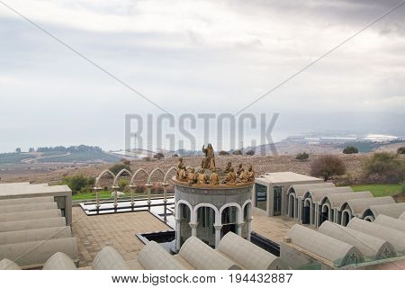 GALILEE, ISRAEL - DECEMBER 3: The statues of Jesus and Twelve Apostles in Domus Galilaeae on the Mount of Beatitudes near the Sea of Galilee, Israel on December 3, 2016