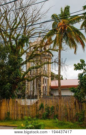 Catholic Cathedral On The Background Of Palm Trees In The Philippines. Pandan, Panay