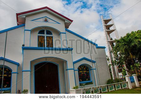 Church with a bell tower in the Philippines. Pandan Panay island