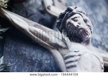 crucifixion of Jesus Christ as a symbol of resurrection and immortality of the human soul (old wooden statue)