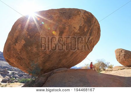 Girl At Bulls Party In Ameib, Erongo, Namibia, Africa. Real Lens Flare Effect.