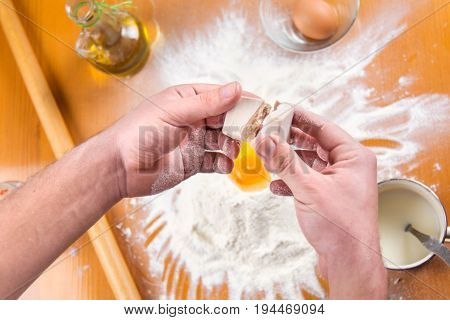 Man Spiting Yeast In Dough Making