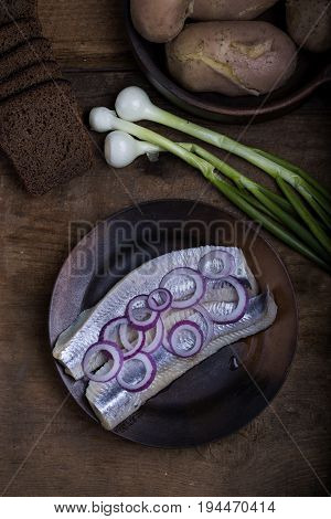 Salted Herring With Potatoes And Onions