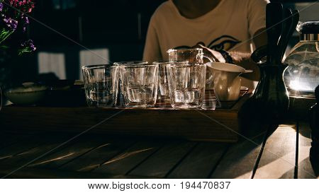 Glass Pialas At The Tea Ceremony Close-up. Transparent Bowls For Drinking Chinese Large-leaf Tea. Te