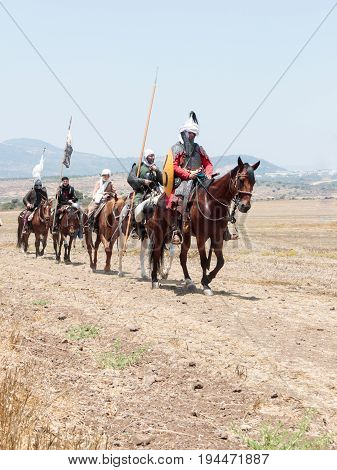 Tiberias Israel July 01 2017 : Participants in the reconstruction of Horns of Hattin battle in 1187 left the camp on horseback and go to the battle site near TIberias Israel
