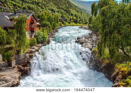 Waterfall in Lom Norway - nature and travel background