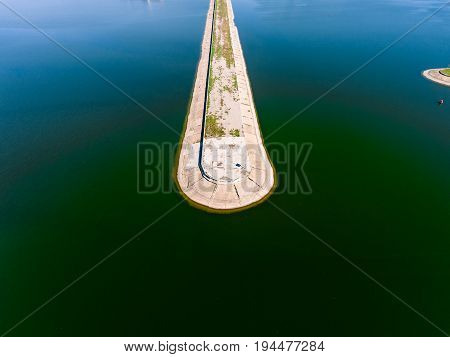Aerial view breakwater at sea, cutwater, pier, groyne mole