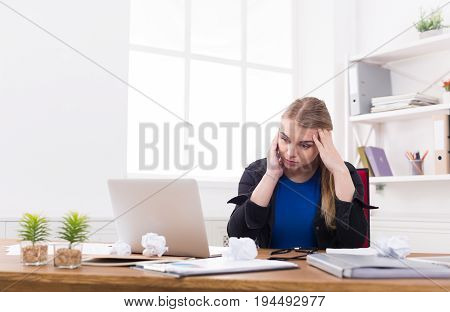 Tired pregnant businesswoman at office copy space. Expectant business lady feeling sick at work, gestosis concept
