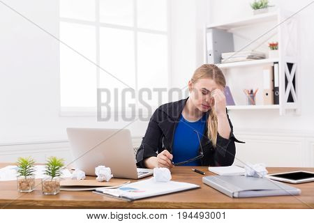 Tired pregnant businesswoman at office copy space. Expectant business lady feeling sick at work, gestosis concept