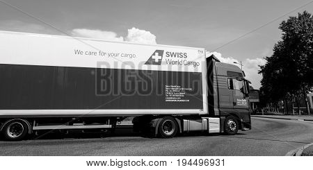 ZURICH SWITZERLAND - MAY 29 2017: Black and white of MAN 18 400 Tgx truck with white trailer from the Swiss WorldCargo to transport cargo to numerous destinations.