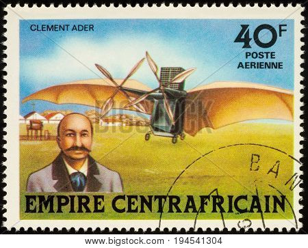 Moscow Russia - July 09 2017: A stamp printed in Central African Empire shows French aviation inventor Clement Ader and his airplane Avion III series 