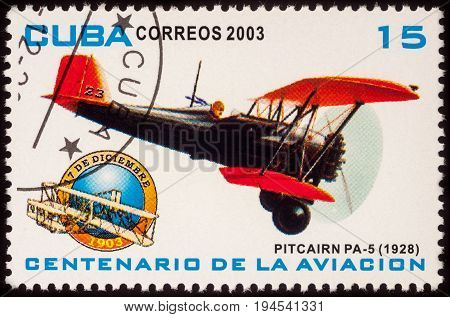 Moscow Russia - July 07 2017: A stamp printed in Cuba shows old American airplane Pitcairn PA-5 Mailwing (1928) series 
