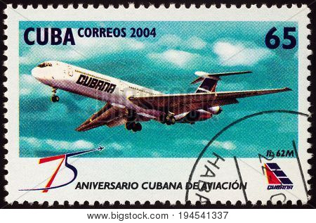 Moscow Russia - July 10 2017: A stamp printed in Cuba shows passenger aircraft IL 62M series 