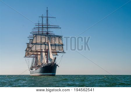 Clear sky, sunny afternoon , Four-masted barque front view