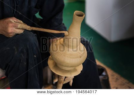 Senior Asian Handcraft Potter Making Clay Pot Earthware By Hand.