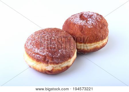 Homemade Doughnuts with Jelly filled and powdered sugar isolated on white background. Selective focus