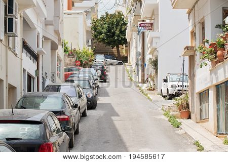 Agis Nikolaos, Crete, Greece - June 13, 2017: Cars parked in the street