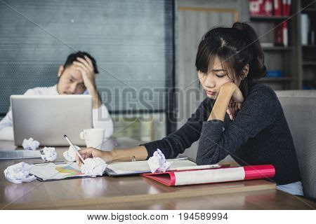 Asian Woman Working With Serious Situation At Office Woman With Stressful Concept 20-30 Years Old.