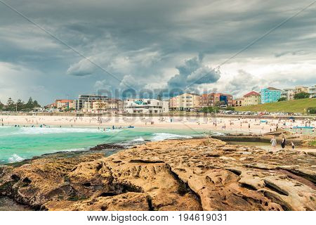 Sydney Australia - November 6 2015: People having fun at Bondi Beach on a day before storm