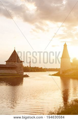 High And Flat Towers Of The Pskov Fortress On The Sunset.