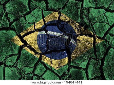 Brazil flag painting on high detail cracked ground . 3D illustration .