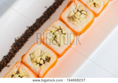 Dessert Maki Sushi - Roll With Various Fruit In Rice Pudding And Coconut Flakes