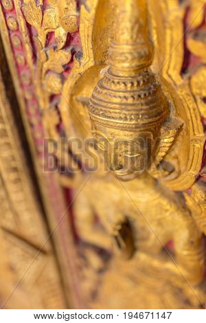 Beautiful golden carving on the door of Wat Sensoukharam temple in Luang Prabang, Laos
