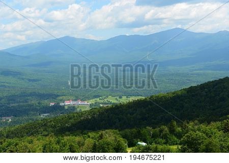 Mount Washington Hotel in summer, from summit of Mount Rosebrook, Bretton Woods, New Hampshire, USA. Now Mount Washington Hotel is registered as a National Historic Landmark.
