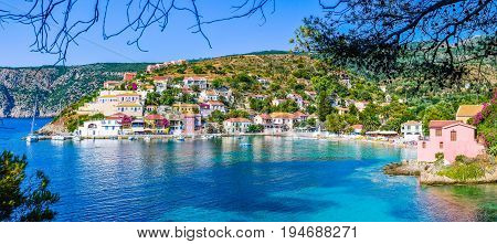 Assos village in beautiful azure cove in Kefalonia, Greece. Banner