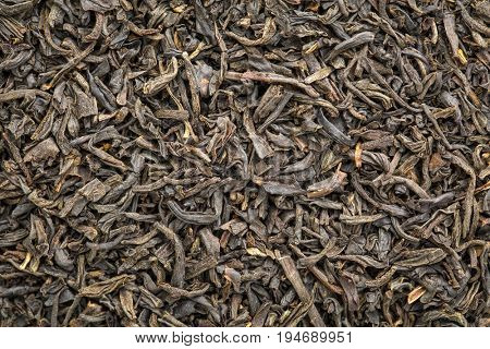 texture of Chinese congou black tea, macro image of loose leaves