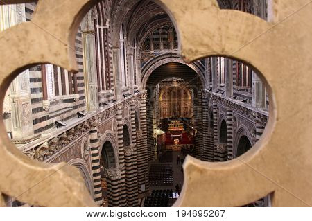 Italy Siena - December 26 2016: interior view of Metropolitan Cathedral of Santa Maria Assunta and the Gate of Heaven on December 26 2016 in Siena Tuscany Italy.
