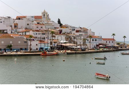 FERRAGUDO, PORTUGAL - APRIL 24, 2017: Picturesque view of Ferragudo fishing village in Algarve, Portugal