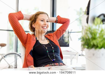 Young woman in office