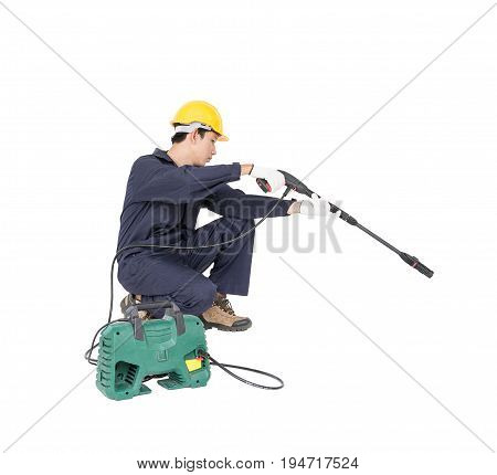 Young Man Sitting And Holding High Pressure Water Gun