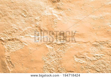 Cream rough stucco, render background, pitted and uneven