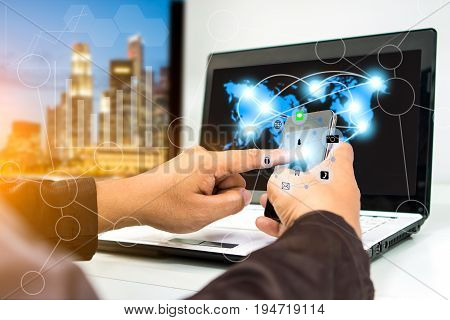 businessman using smartphone upload data to online store Documentation over blurred Distributed threat information to clients for customer network connection .digital technology.select focus