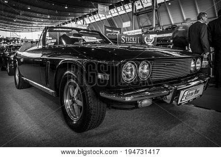STUTTGART GERMANY - MARCH 17 2016: Grand tourer car Jensen Interceptor MkIII Convertible 1974. Black and white. Europe's greatest classic car exhibition 