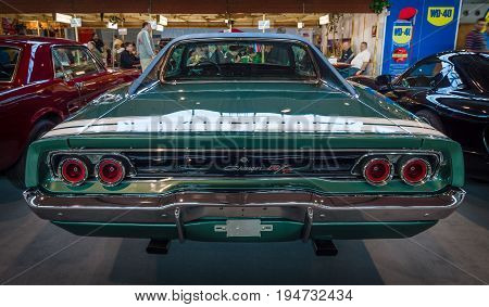 STUTTGART GERMANY - MARCH 17 2016: Muscle car Dodge Charger R/T 1968. Rear view. Europe's greatest classic car exhibition 