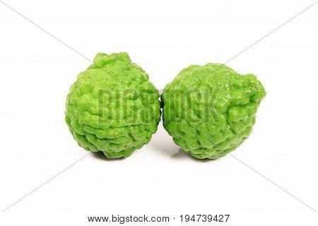 Kaffir lime and kaffir lime leaf on white background