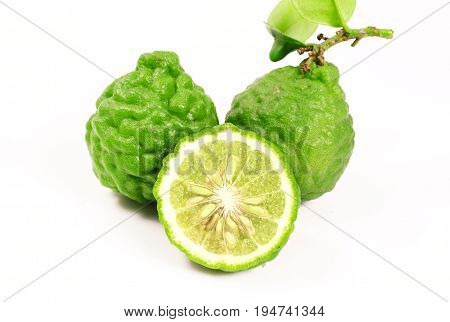 Kaffir lime and kaffir lime leaf on white background